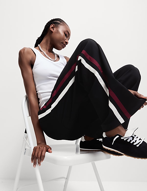 Wide leg trousers with stripe down side top