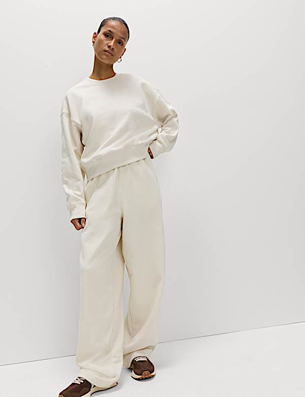 מכנסי טרנינג מכותנה טהורה בגזרה נינוחה ורפויה - IL