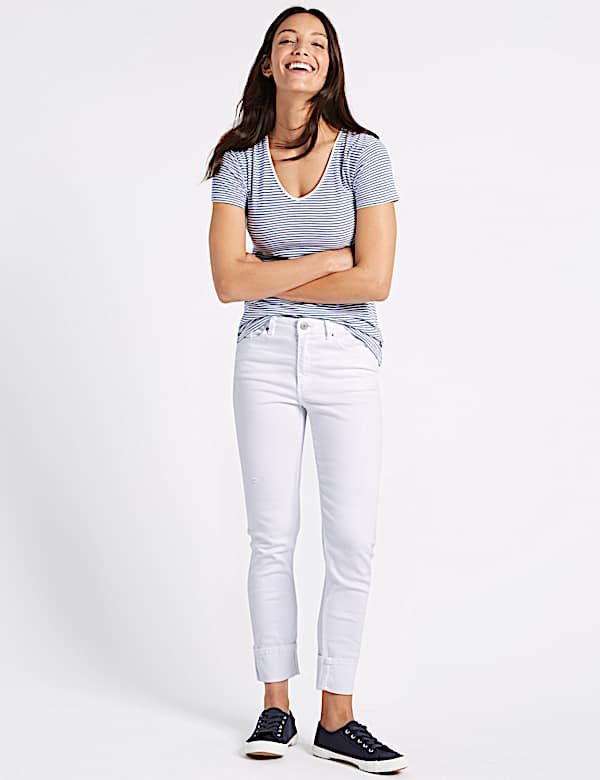 Ripped Mid Rise Relaxed Slim Jeans