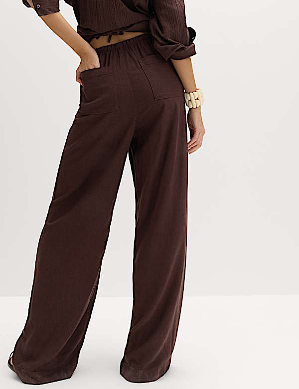 מכנסיים בגזרה רחבה בשילוב פשתן עם שרוך הידוק - IL