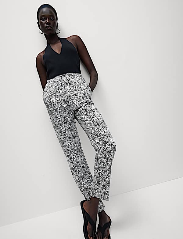 Broek van zuiver twill met toelopende pijpen, hoge taille en print - NL