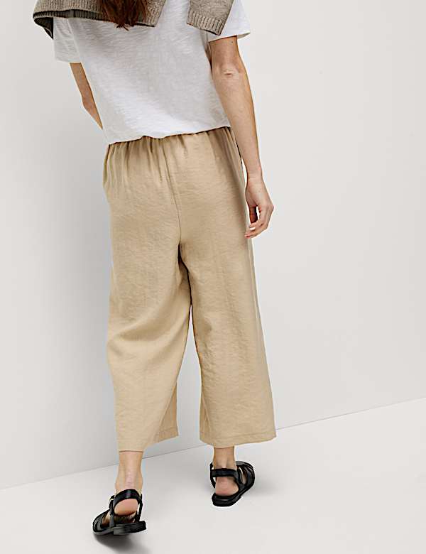 Kortere lyocell-rijke broek met wijde pijpen - NL