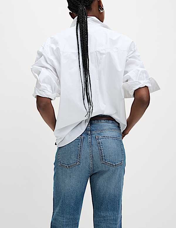 Skr&oacute;cone dżinsy slim fit z wysoką talią - PL