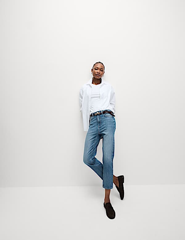 Skr&oacute;cone dżinsy slim fit z wysoką talią - PL