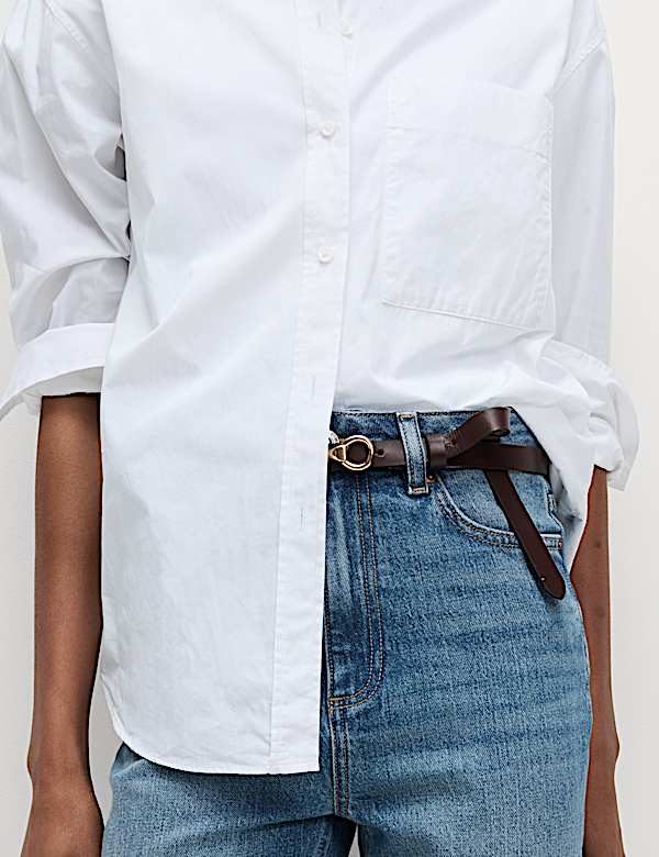 Skr&oacute;cone dżinsy slim fit z wysoką talią - PL