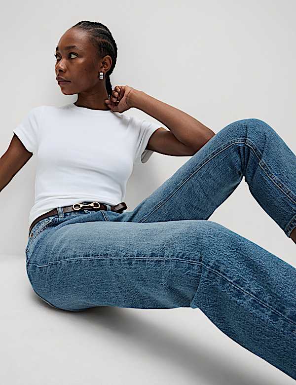 Skr&oacute;cone dżinsy slim fit z wysoką talią - PL