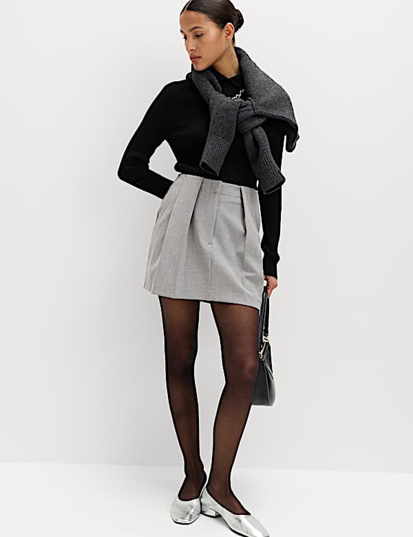 Minifalda plisada jaspeada - ES