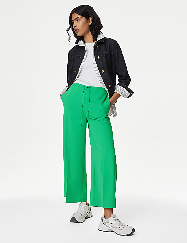 Green wide leg cropped trousers hotsell