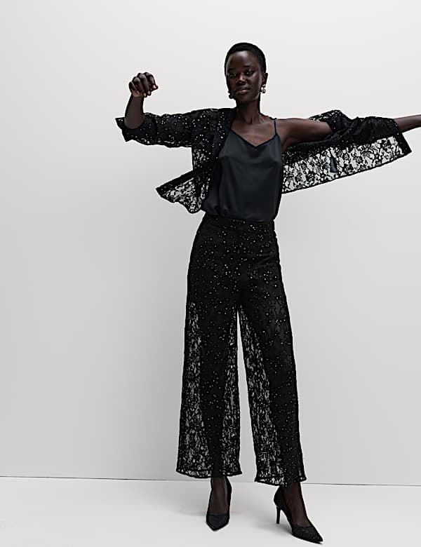 Hose mit weitem Bein, Spitze, Strass und Stretch - DE