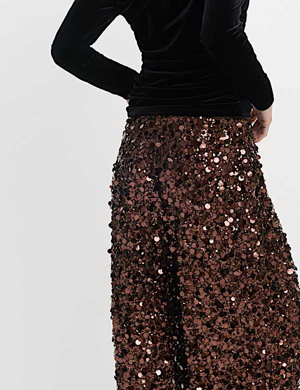 Broek met lovertjes en wijde pijpen - NL