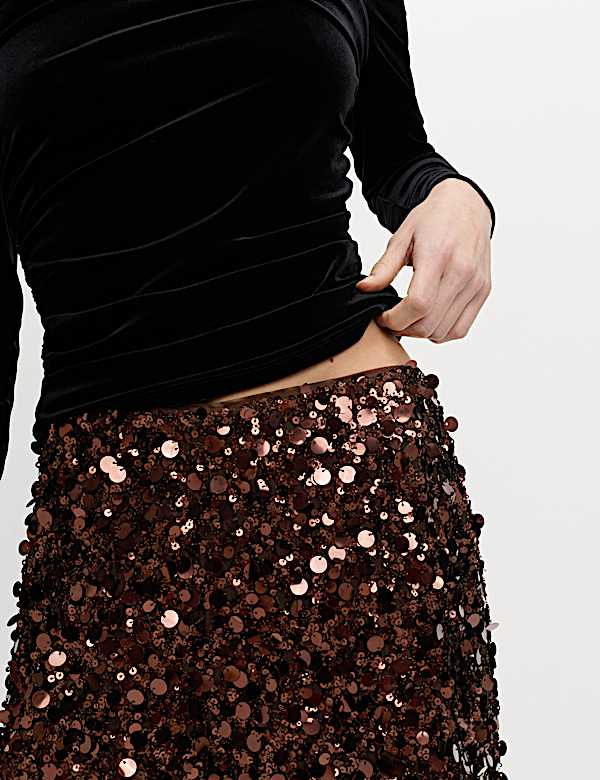 Broek met lovertjes en wijde pijpen - NL