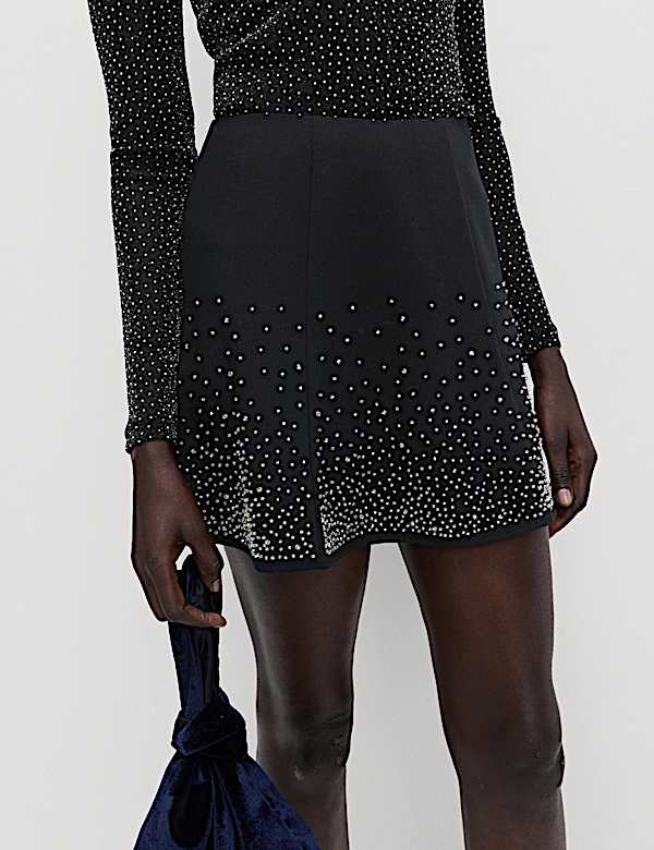 Minifalda skater con adornos diseminados - US