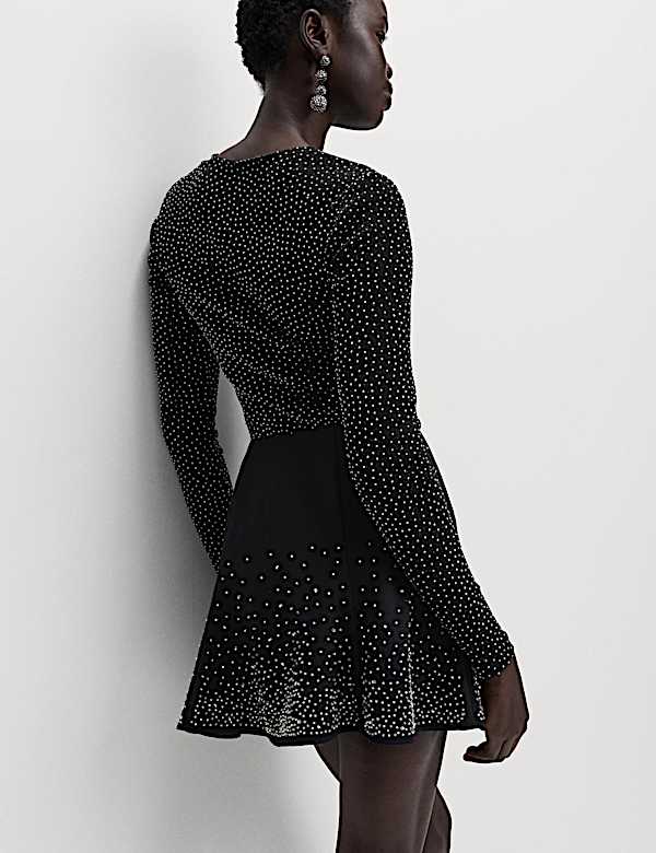 Minifalda skater con adornos diseminados - US