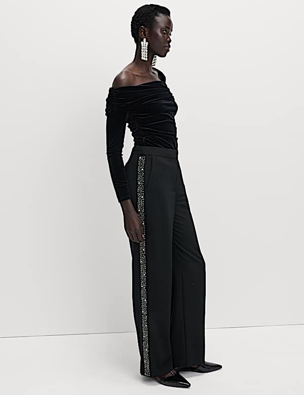 Pantalón con rayas en el lateral con adorno - ES