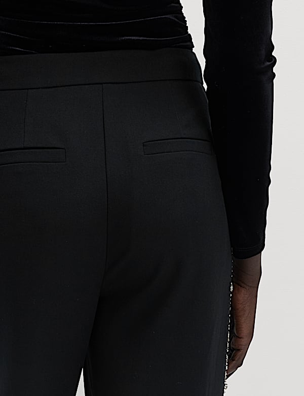 Pantalón con rayas en el lateral con adorno - ES