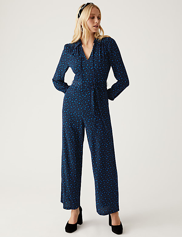 Star Print Tie Neck Belted Jumpsuit