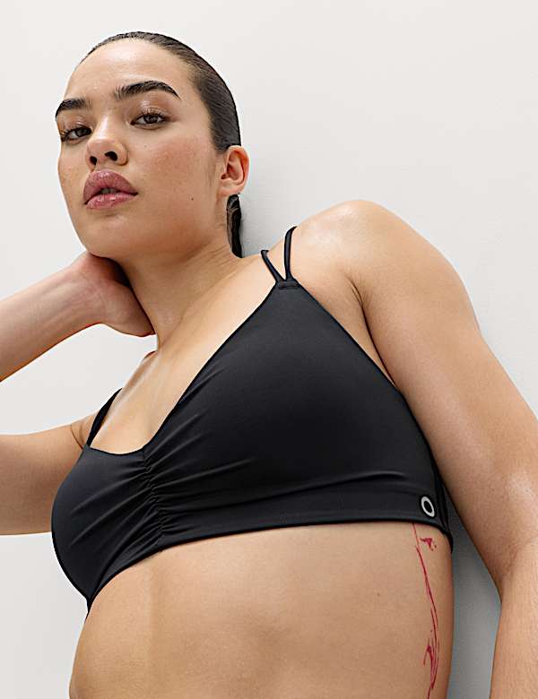 Tr&oacute;jkątny biustonosz sportowy bez fiszbin do mało intensywnych trening&oacute;w - PL