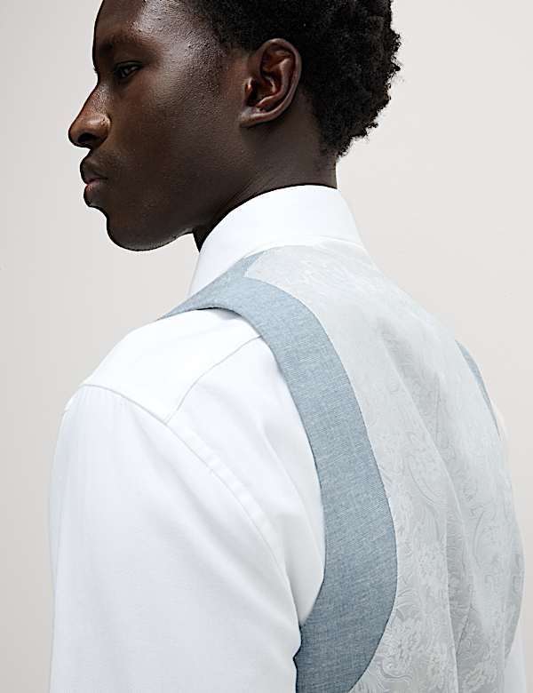 וסט בגזרה מחויטת ובשילוב פשתן עם רכיסת כפתורים כפולה - IL