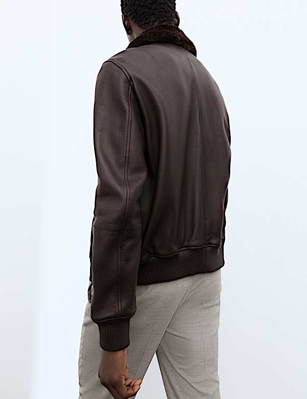 Cazadora bomber de piel con cuello de piel de borreguito - US