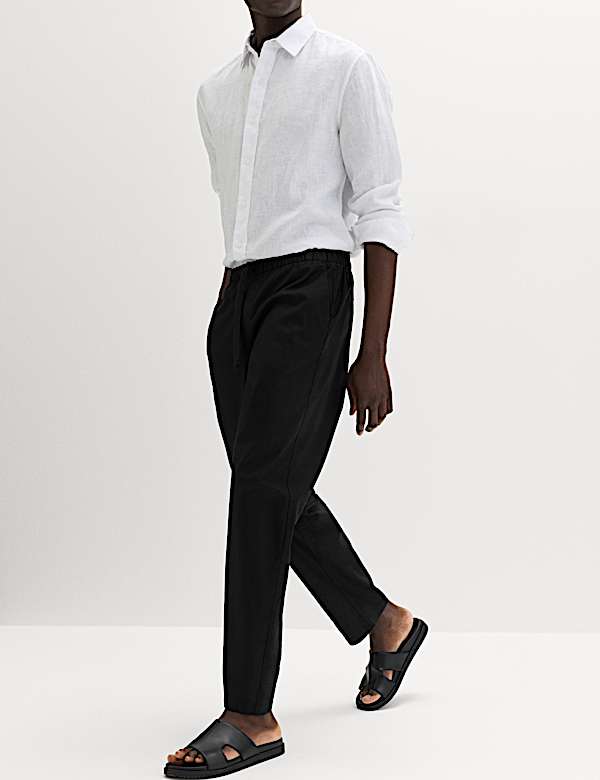 Pantalones con cintura con el&aacute;stico de corte holgado en mezcla de lino - ES