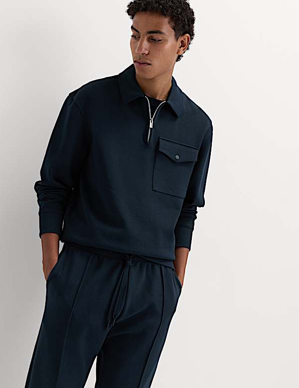 Piqu&eacute; top met korte rits van een katoenmix - NL