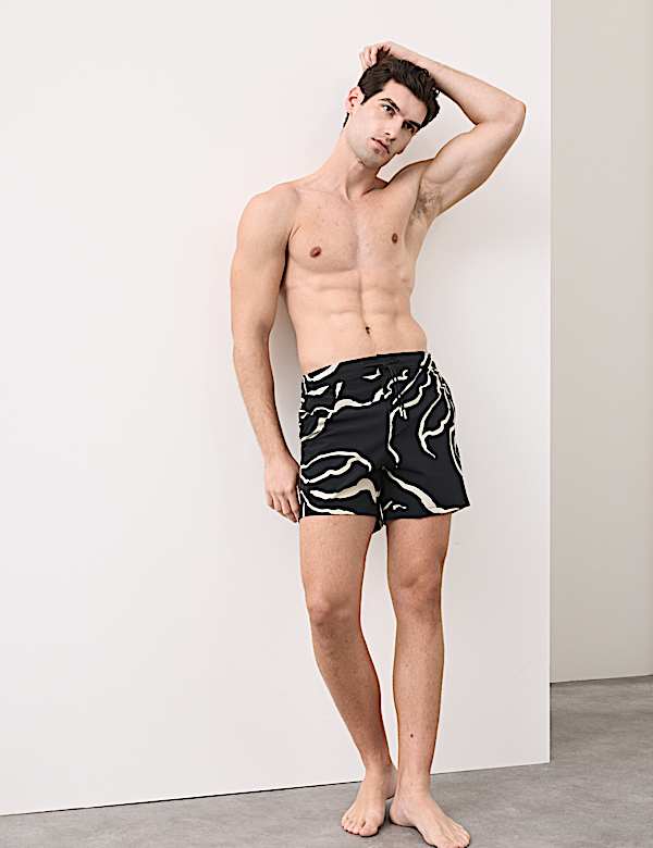 Short de bain fleuri, s&eacute;chage rapide - FR