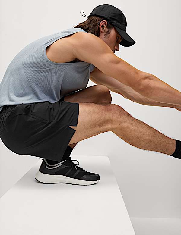 Pantalones cortos deportivos de corte estándar elásticos de 13 cm - ES