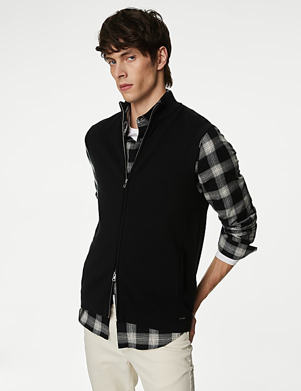 Chaleco punto negro best sale