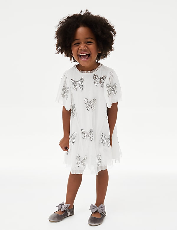 Robe de fete ornee de sequins et n ud du 2 au 8 ans