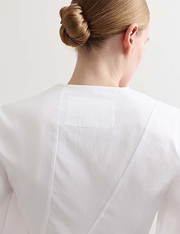Zuiver katoenen blouse met knoopsluiting en V-hals - NL