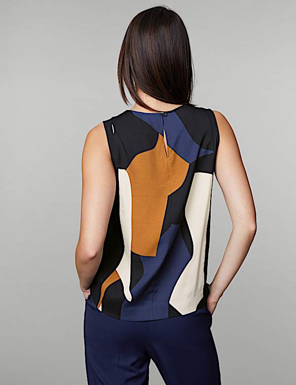 Blus Leher Bundar Bermotif - ID