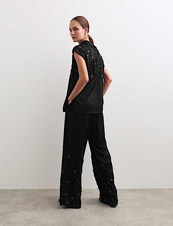 Top con cuello chimenea y adornos - ES