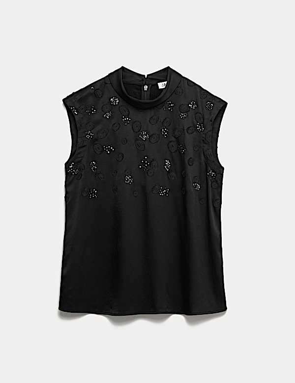 Top con cuello chimenea y adornos - ES