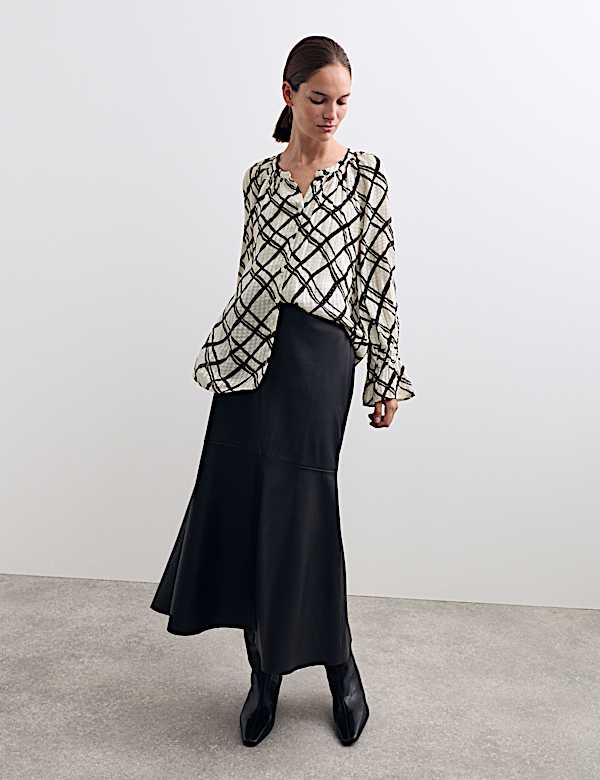 Blusa con cuello redondo a rayas - ES