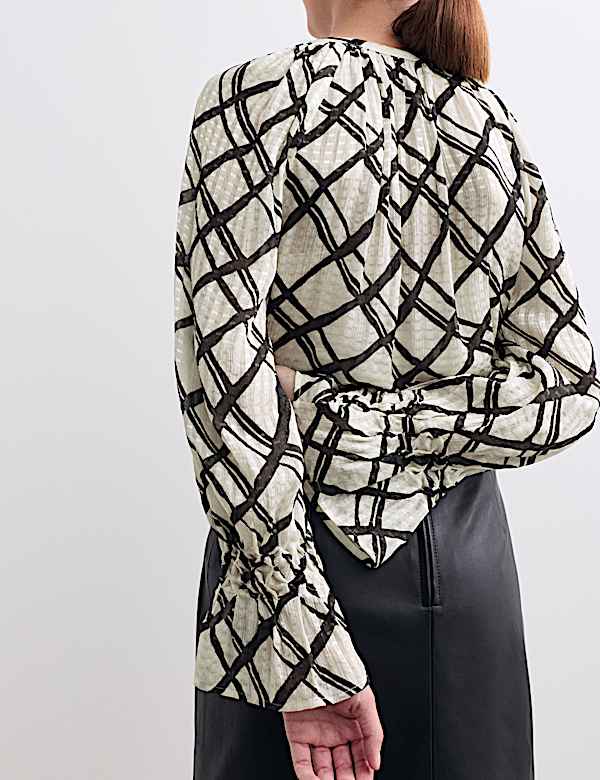 Blusa con cuello redondo a rayas - ES