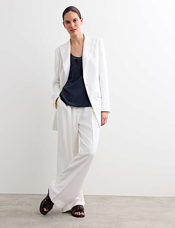 Top van zuivere zijde met gevormd schelpdetail - NL