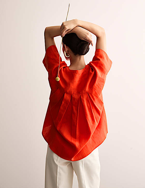 Top 100 % lino con detalle de botón - ES