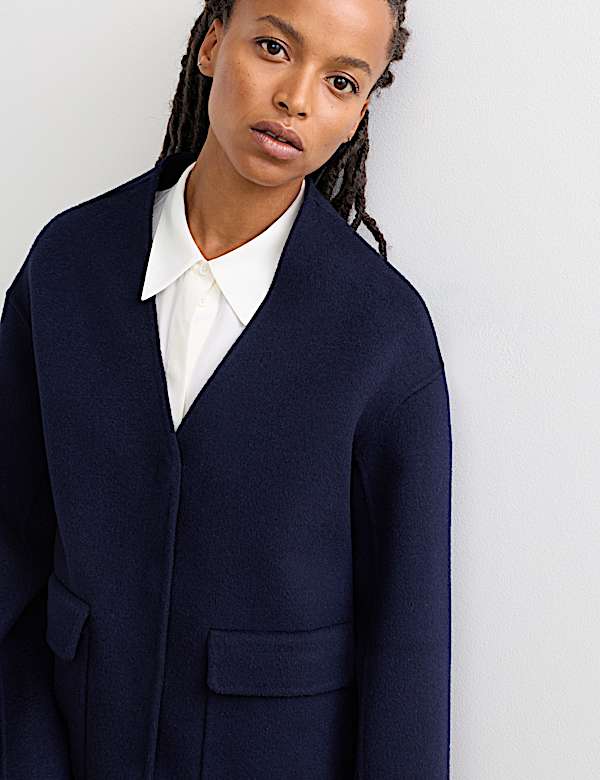 Kort dubbelzijdig jasje van zuiver wol - NL