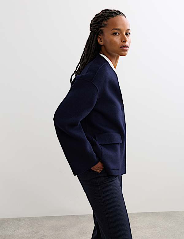 Kort dubbelzijdig jasje van zuiver wol - NL