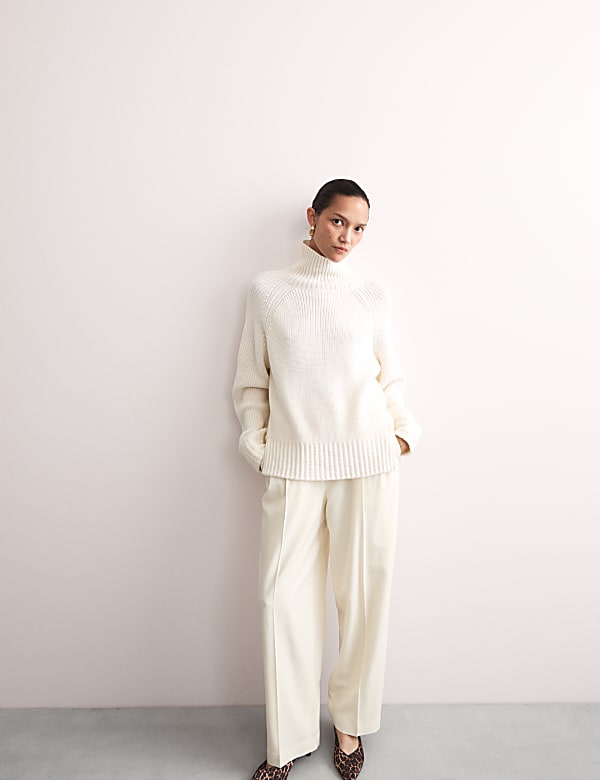 Pantalón de pata ancha con pinzas de lana - ES