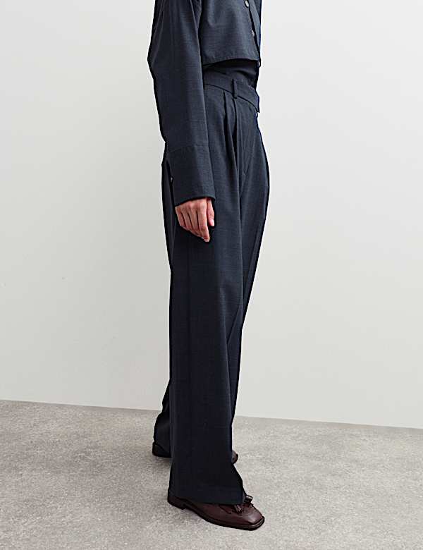 Pantalones de lana de pernera ancha con plisado - ES