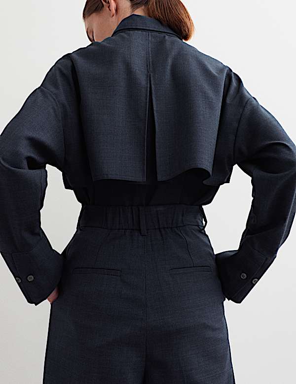 Pantalones de lana de pernera ancha con plisado - ES