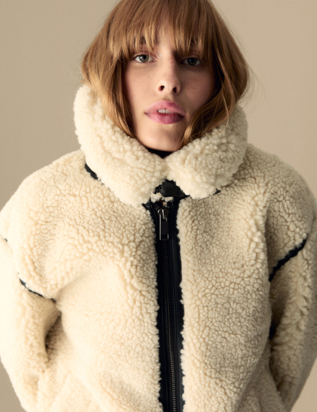 This aviator jacket from Per Una collection is crafted from borg-textured faux shearling material for a cosy feel. It's designed in an easy regular fit, and features a zip-through fastening to create a streamlined look. The collar is complete with a buckle fastening to give a vintage-inspired finish. Per Una: stylish designs crafted with carefully considered details and feminine flourishes.
