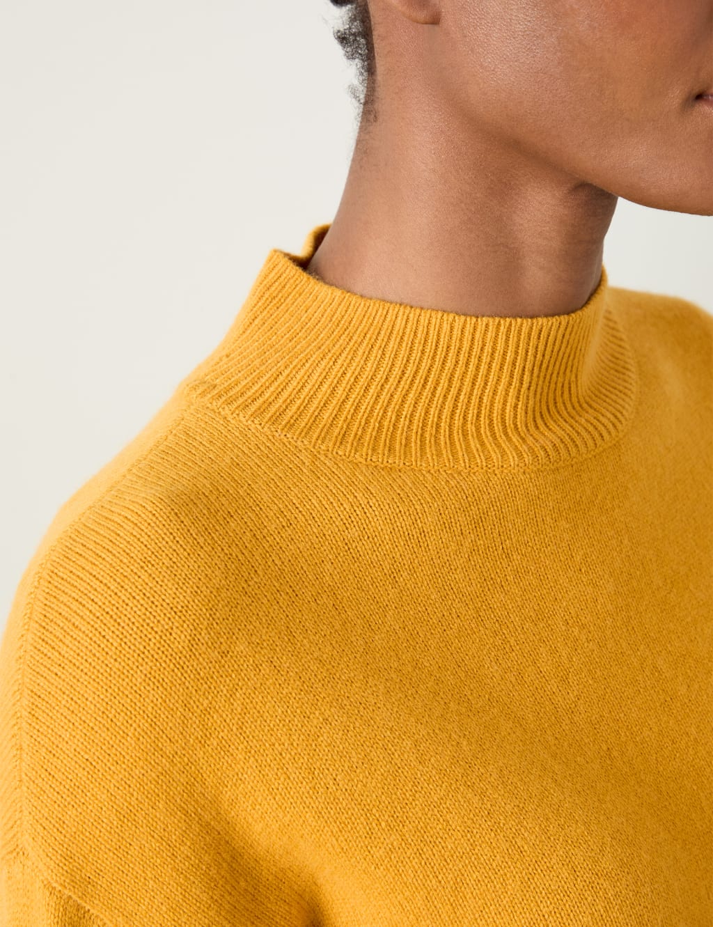 Yellow funnel neck jumper top