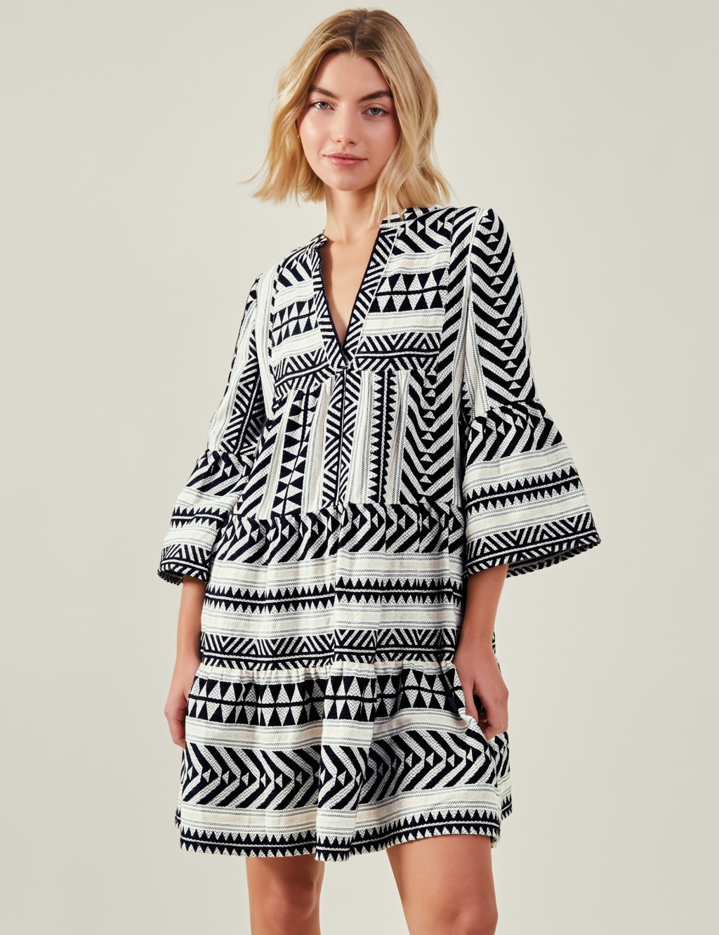 Accessorize beach dress top
