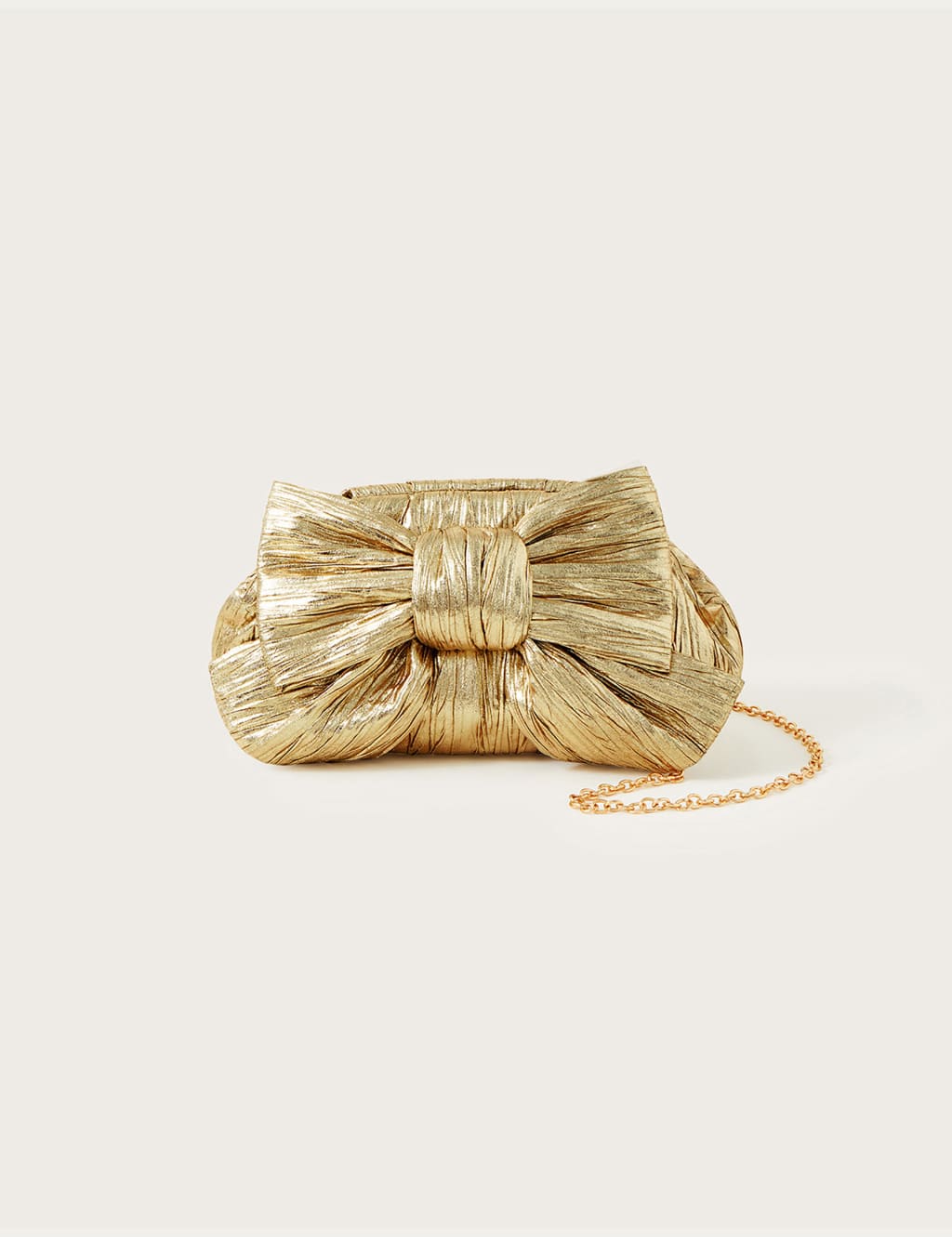 Clutch bag with bow top