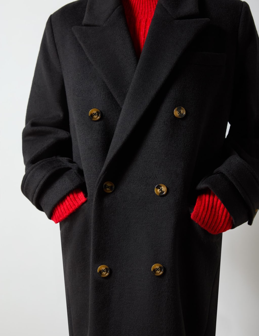 Black coat with red patch store