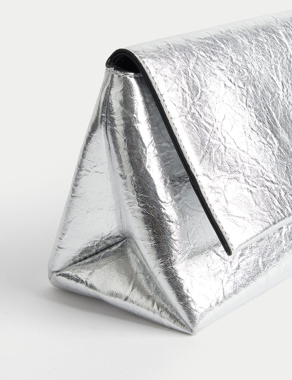 Metallic clutch bag top