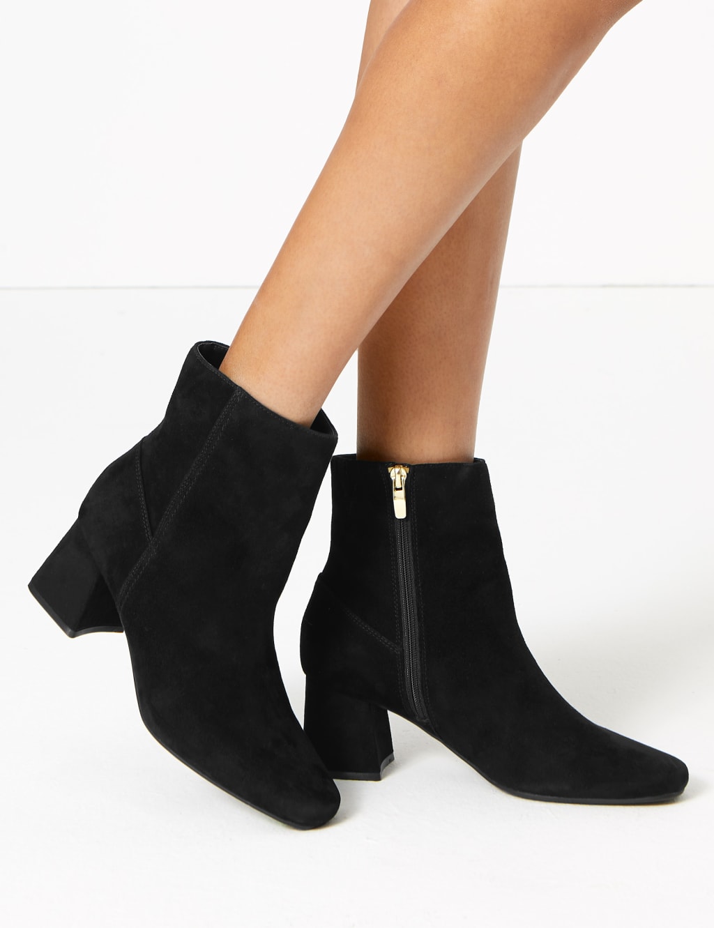 Flared heel ankle boots 2025