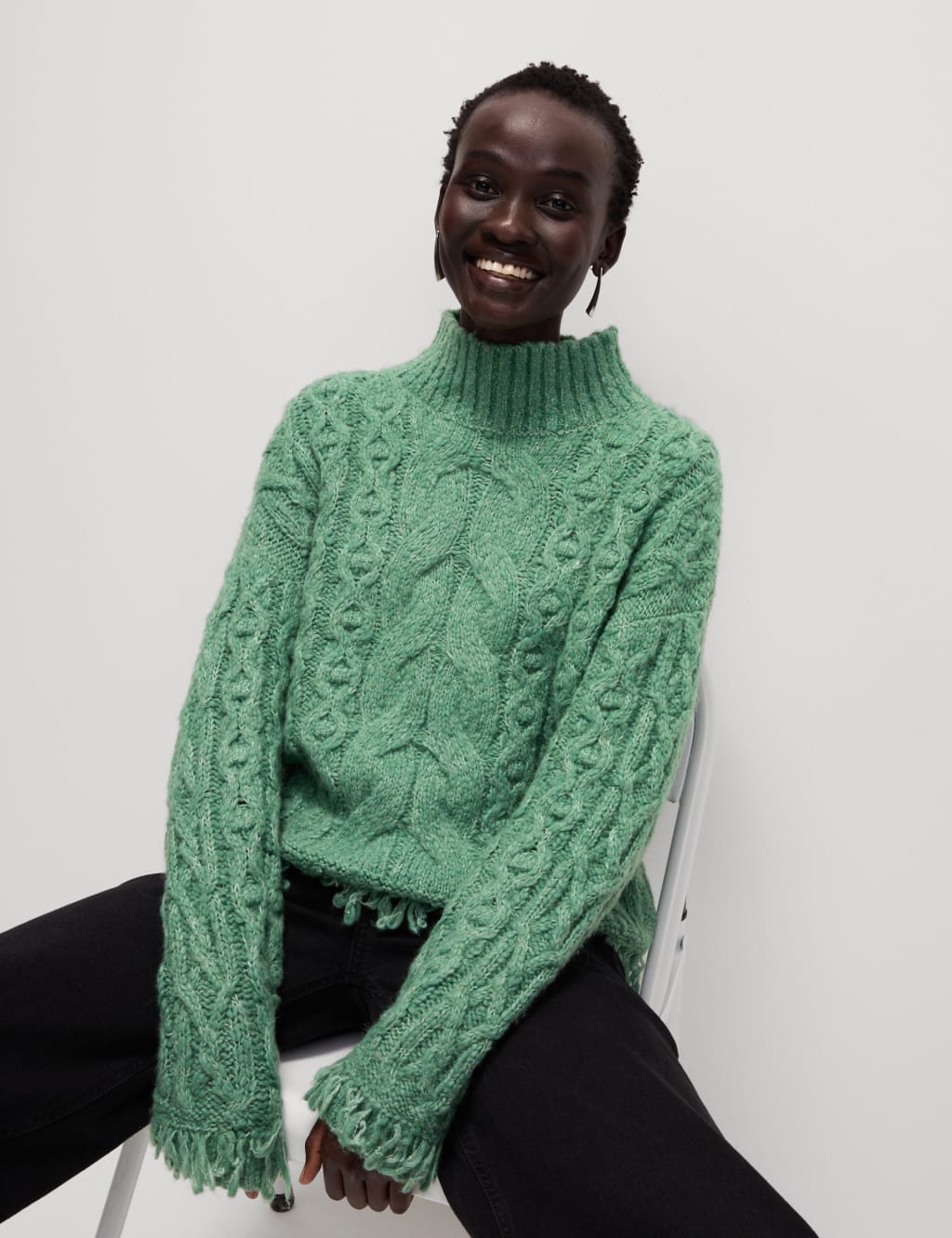 Wool cable knit turtleneck sweater on sale
